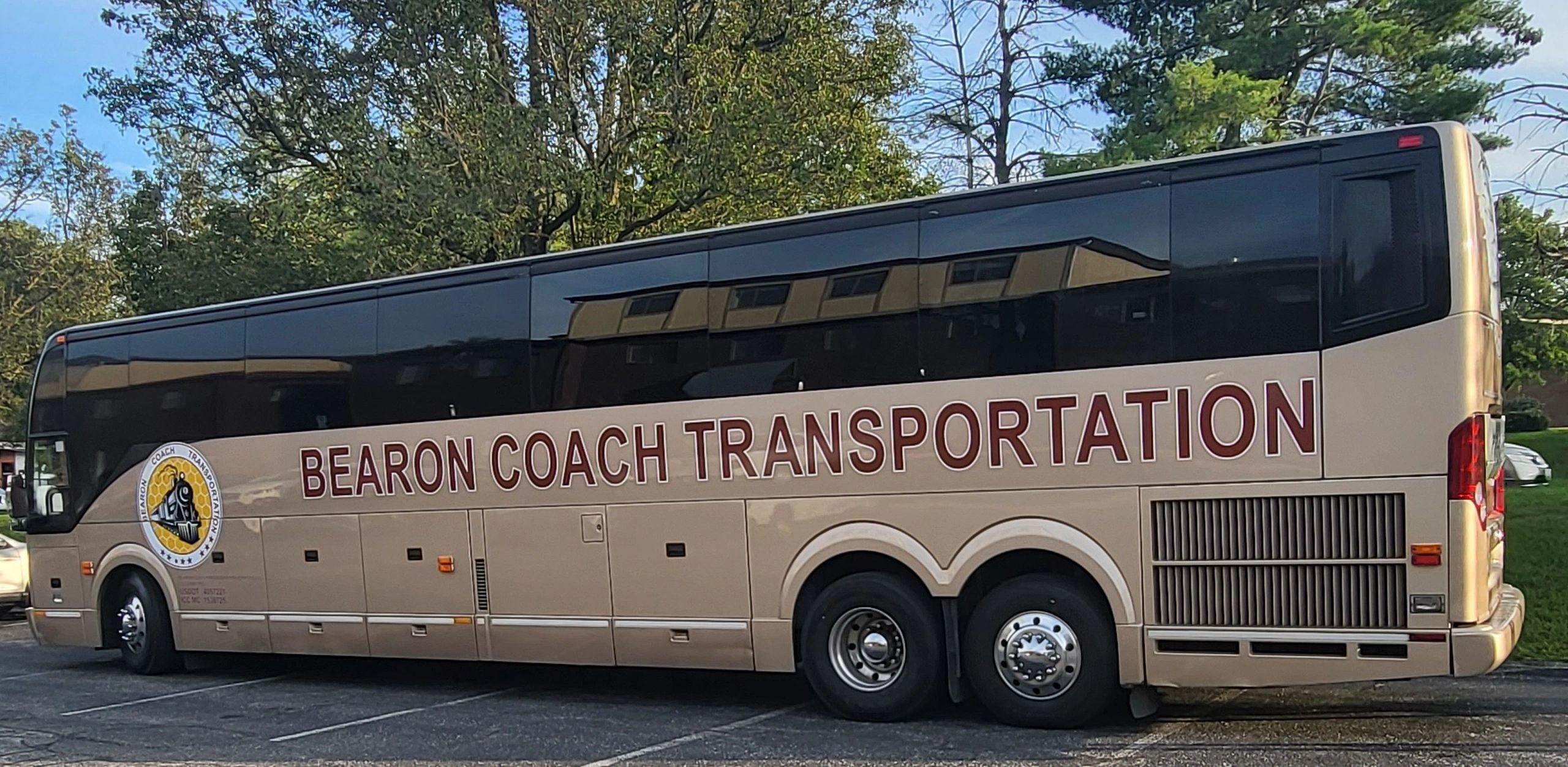 Bearon Coach tan bus drivers side