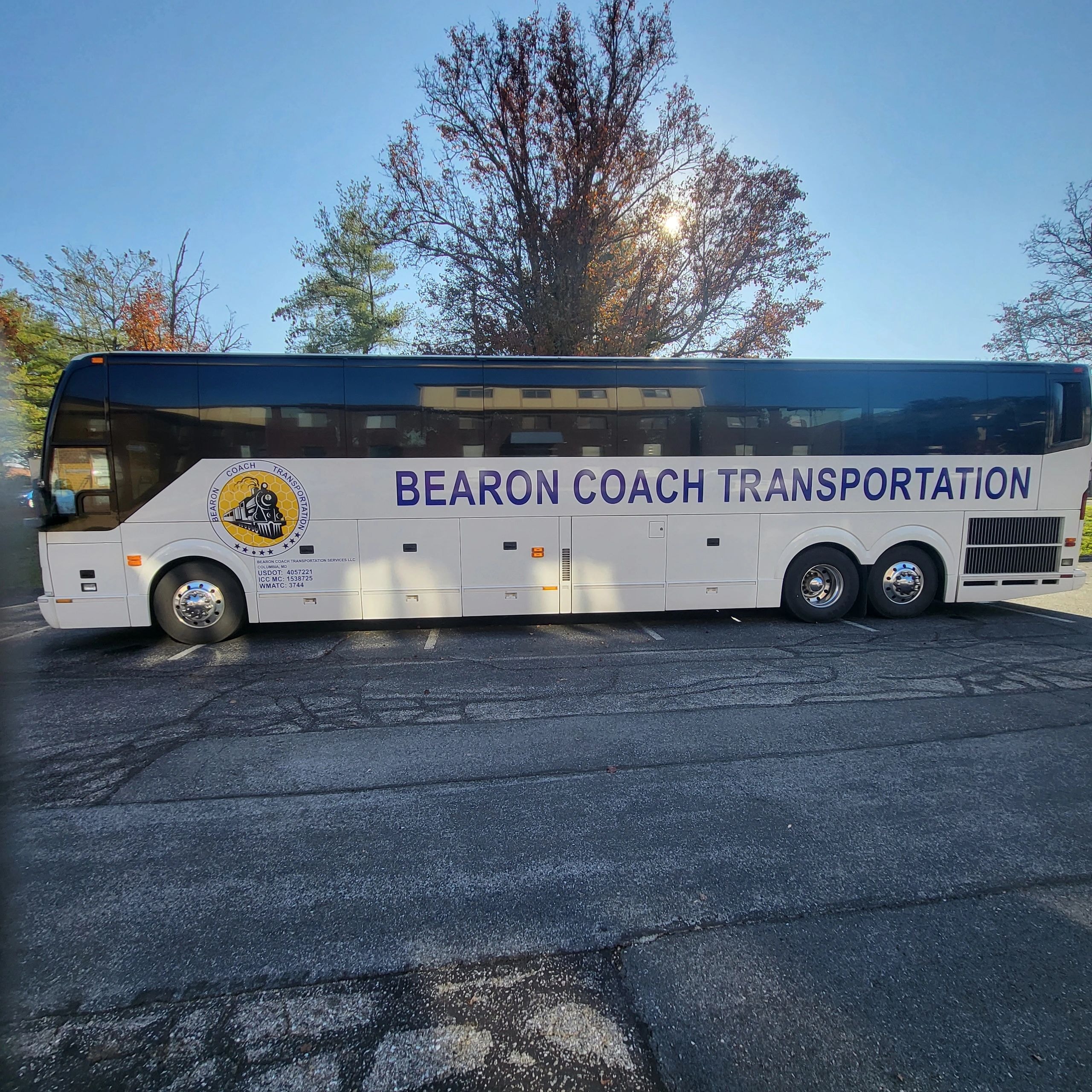 Bearon Coach white bus side view